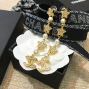 Luxuriöse Ohrringe mit Perlen-Strass-Stern-Anhänger