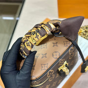 Luxuriöse Bucket Bag Handtasche aus bedrucktem Leder