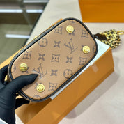 Luxuriöse Bucket Bag Handtasche aus bedrucktem Leder